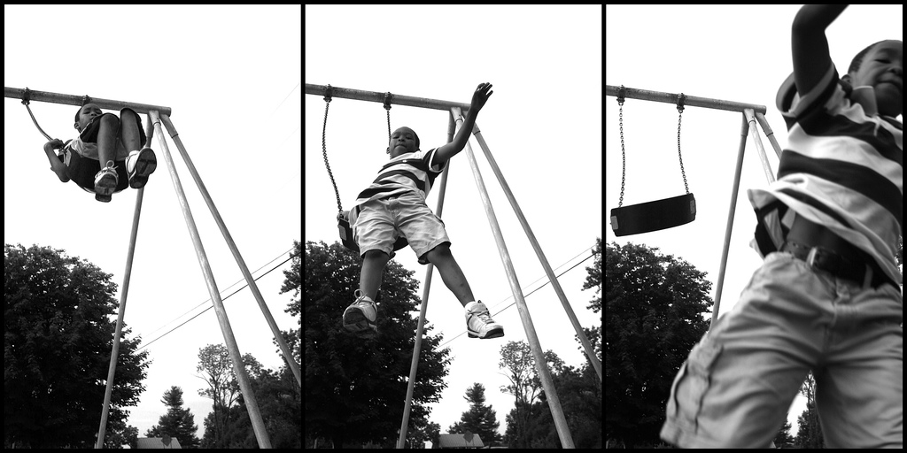 boy swinging