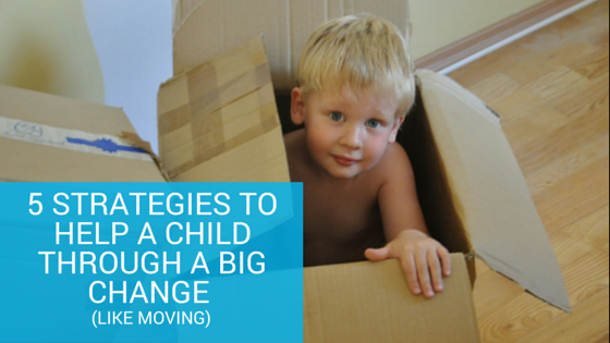 child in moving box